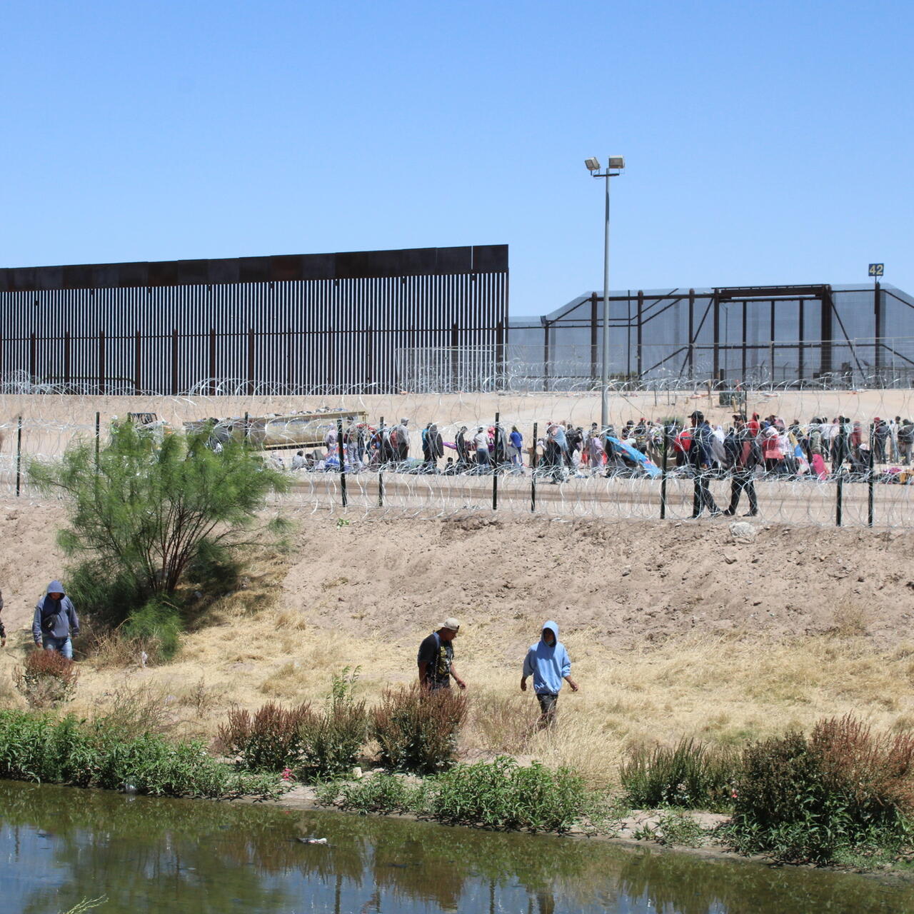 People queuing at the US-Mexico border.